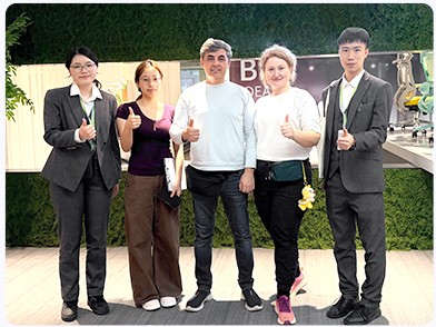 ErgoSeat team with overseas partners at an international furniture exhibition
