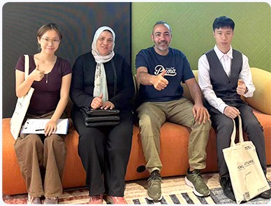 ErgoSeat team with partners at an overseas exhibition stand