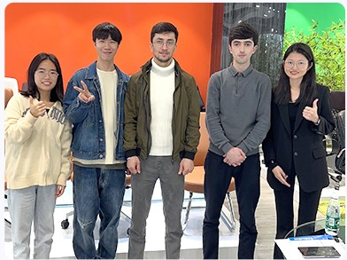 ErgoSeat team with overseas partners at a trade show