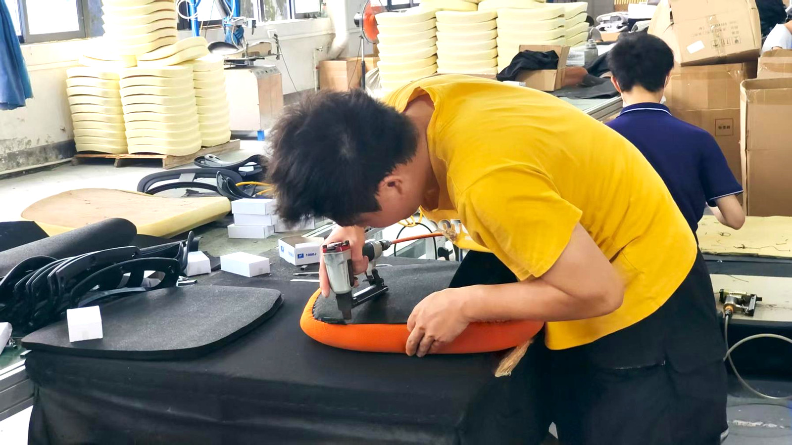 Hand upholstery on the ErgoSeat production line