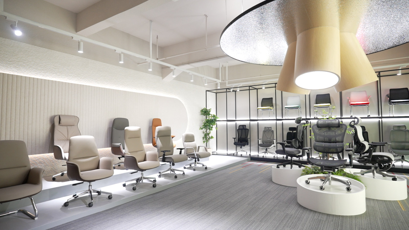 ErgoSeat showroom — the full chair range displayed on the wall