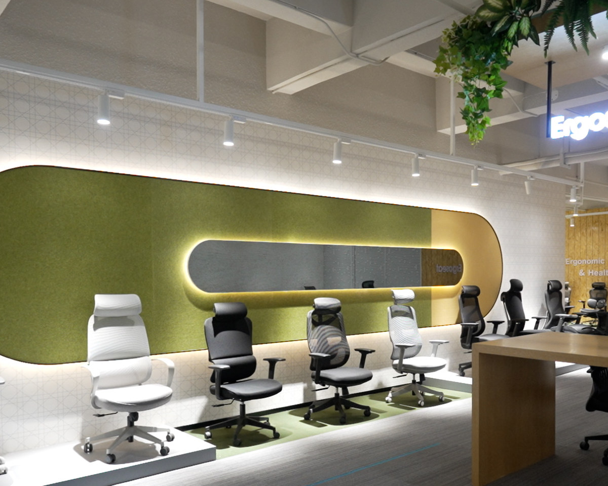 ErgoSeat showroom model wall with every chair series on display